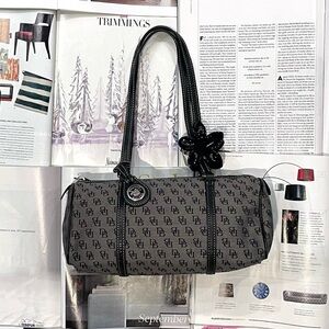 Dooney & Bourke vintage black monogram canvas & leather barrel bag